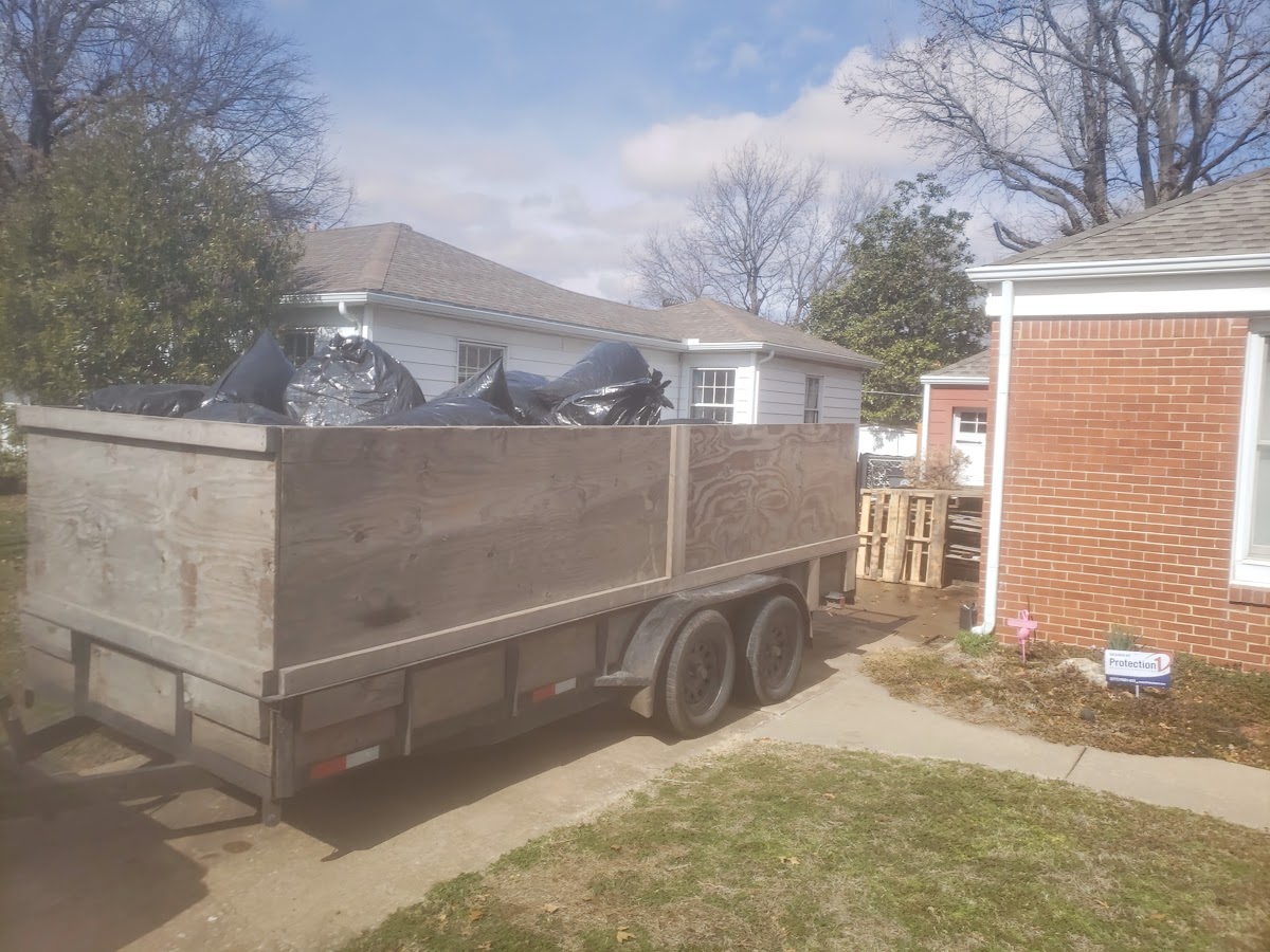 Tulsa J's Junk Removal truck and crew